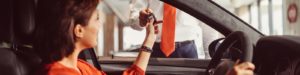 A woman receives the keys for her new honda